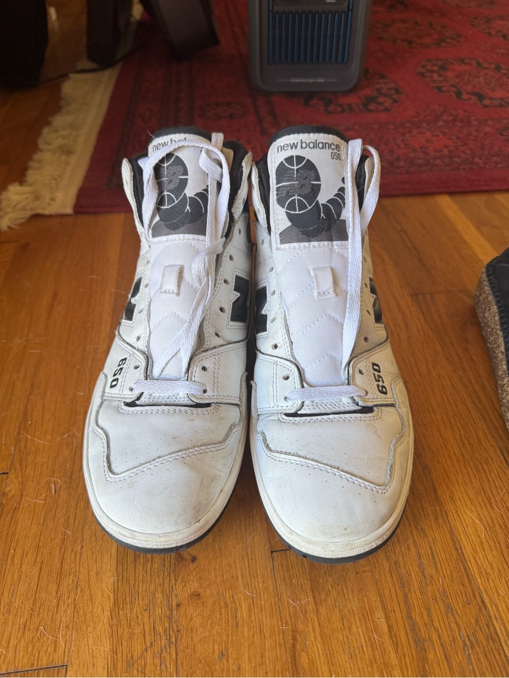 New Balance 650 White and Black High-Top Sneakers